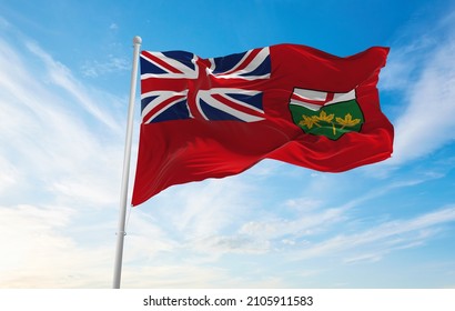 flag of Ontario , Canada at cloudy sky background on sunset, panoramic view. Canadian travel and patriot concept. copy space for wide banner. 3d illustration