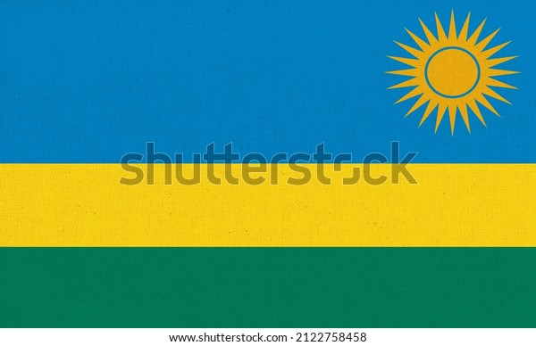 Flag of Rwanda. Rwanda flag on\
fabric surface. Fabric Texture. National symbol. Republic of\
Rwanda