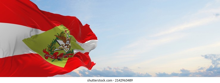 flag of Santa Catarina , Brazil at cloudy sky background on sunset, panoramic view. Brazilian travel and patriot concept. copy space for wide banner. 3d illustration