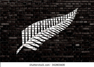 flag of Silver fern painted on brick wall