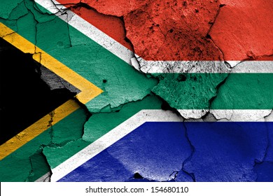 flag of South Africa painted on cracked wall