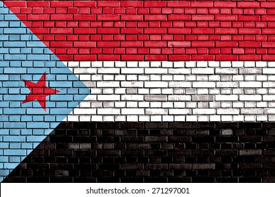 Flag Of South Yemen Painted On Brick Wall