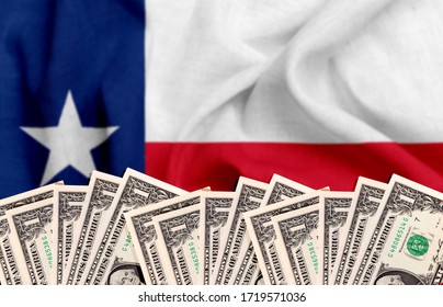 Flag of texas, with US Dollars (USD) in the background