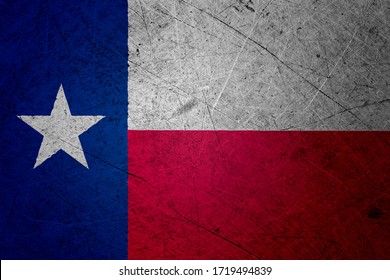 Flag of Texas, USA, on a grunge metal texture