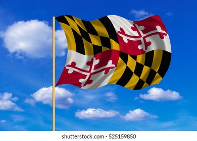 Flag of the US state of Maryland. American patriotic element. USA banner. United States of America symbol. Maryland official flag on flagpole waving in the wind, blue sky background. Fabric texture