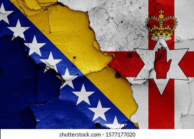 flags of Bosnia and Herzegovina and Northern Ireland painted on cracked wall