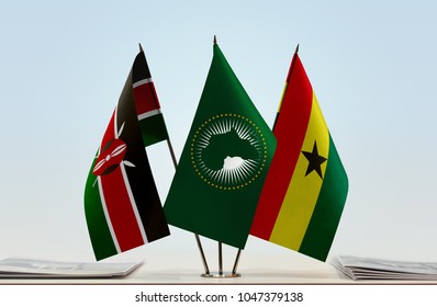 Flags Of Kenya African Union And Ghana. Cloth Of Flags Is 3d Rendering, The Rest Is A Photo.