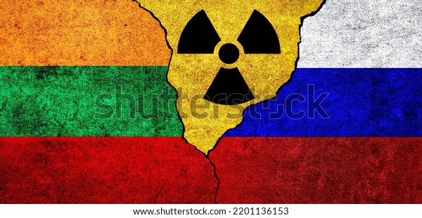 Flags of Lithuania, Russia and radiation symbol\
together. Russia and Lithuania Nuclear deal, threat, agreement,\
tensions concept