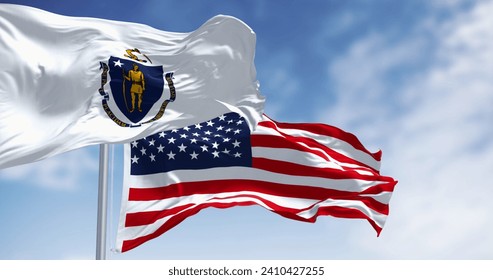 The flags of Massachusetts and the United States waving in the wind on a clear day. Patriotism and identity concept. 3d illustration render. Rippled fabric