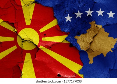 Flags Of North Macedonia And Kosovo Painted On Cracked Wall