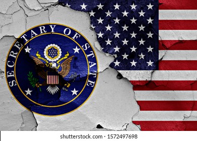 Flags Of Secretary Of State And USA Painted On Cracked Wall