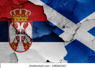 Flags Of Serbia And Scotland Painted On Cracked Wall