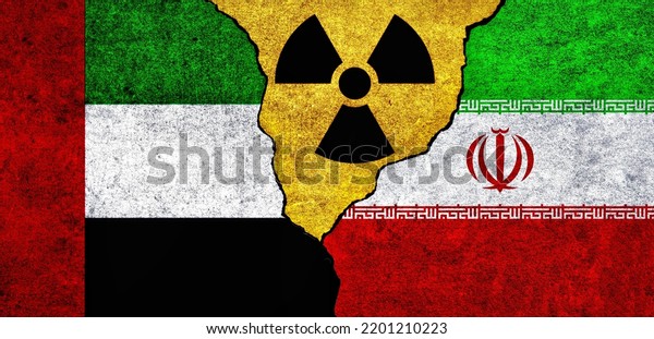 Flags of UAE, Iran and radiation symbol together.\
United Arab Emirates and Iran Nuclear deal, threat, agreement,\
tensions concept