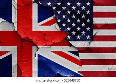 flags of UK and USA painted on cracked wall