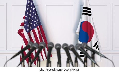 Flags Of The USA And Korea At International Meeting Or Conference. 3D Rendering