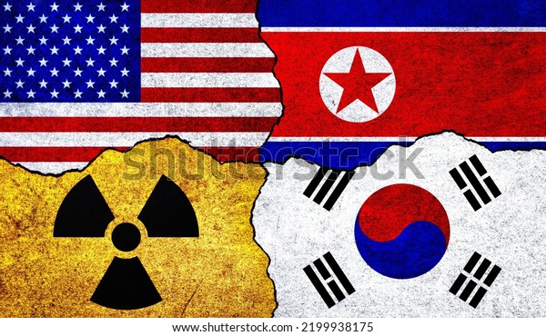 Flags of USA, North Korea, South\
Korea and radiation symbol on a wall. United States of America,\
South Korea and North Korea Nuclear Deal or Tensions\
concept