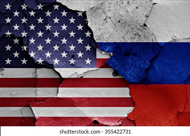 Flags Of USA And Russia Painted On Cracked Wall