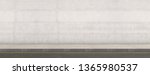 A flat front view of a section of raised sidewalk and street on a plain wall background - 3D render