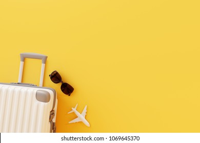 Flat lay white suitcase with sunglasses and plane on yellow background.travel concept
