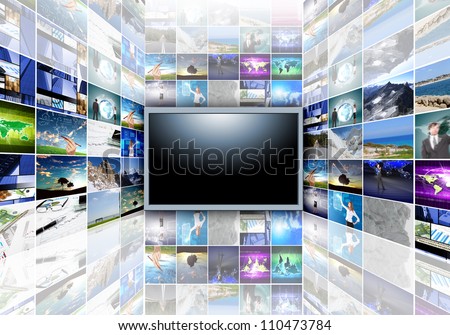 A flat screen television has a blank black text area with photo images coming out of the sides of it. The tv has a glowing light coming out the top