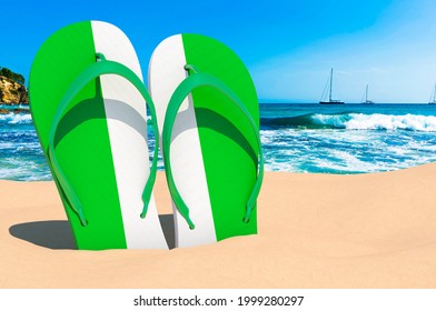 Flip flops with Nigerian flag on the beach. Nigeria resorts, vacation, tours, travel packages concept. 3D rendering
