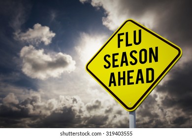 Flu Season Ahead Against Dark Sky With White Clouds