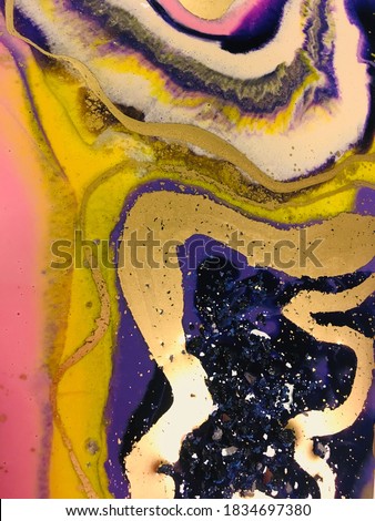 Fluid art. Abstract painting with epoxy resin and alcoholic ink. Oil, acrylic paints, gouache. Modern painting. Colorful rainbow palette. Avant-garde art.                     