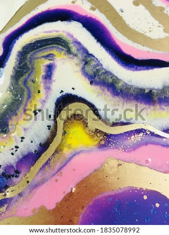 Fluid art. Abstract painting with epoxy resin and alcoholic ink. Oil, acrylic paints, gouache. Modern painting. Colorful rainbow palette. Avant-garde art.                     