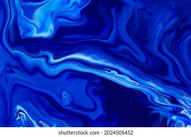 Fluid Art Texture. Backdrop With Abstract Mixing Paint Effect. Liquid Acrylic Picture That Flows And Splashes. Classic Blue Color Of The Year 2020. Blue, White And Indigo Overflowing Colors.