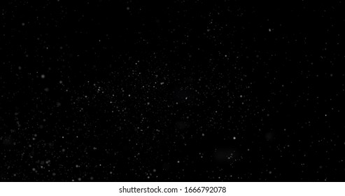 Flying Dust Particles On A Black Background