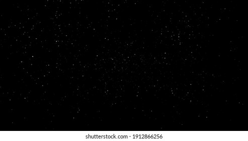 Flying Dust Particles On A Black Background