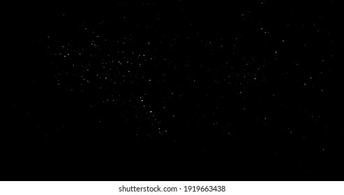 Flying Dust Particles On A Black Background