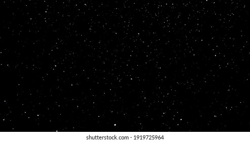 Flying Dust Particles On A Black Background