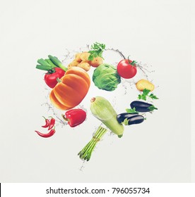 Flying organic food with water splash. Food illustration different vegetables and water splash on isolated white background. 3d illustration - Powered by Shutterstock