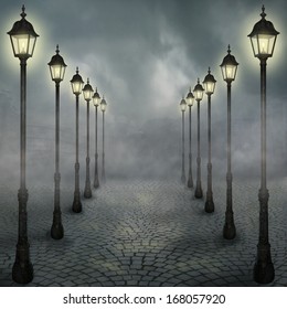 Fog in the park with street lamps