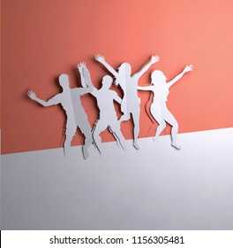 Folded Paper Art Origami.A Group Of Active People Jumping. Paper Craft 3D Illustration. 