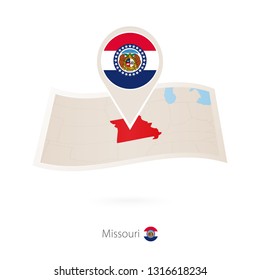 Folded Paper Map Of Missouri U.S. State With Flag Pin Of Missouri. Raster Copy.