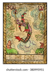 The fool.  Full colorful deck, major arcana. The old tarot card, vintage hand drawn engraved illustration with mystic symbols. Man in costume of harlequin jumping through abyss. Joker and cat.