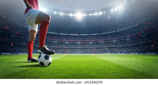 Football player in the stadium. An imaginary stadium is modelled and rendered.