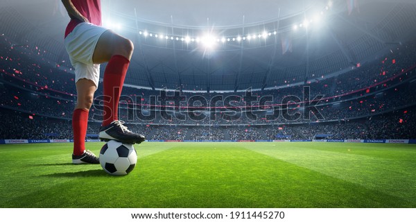 Football player in the stadium. An imaginary\
stadium is modelled and\
rendered.