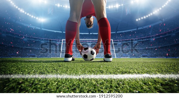 Football player in the stadium. An imaginary\
stadium is modelled and\
rendered.	