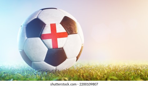 Football Soccer Ball With Flag Of England On Grass. English National Team. 3d Render