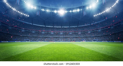 Football Stadium Under the Spotlights with Cheerful Atmosphere
 - Powered by Shutterstock