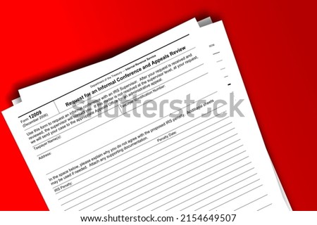 Form 12009 papers. Request for an Informal Conference and Appeals Review. Form 12009 documentation published IRS USA 07.17.2012. American tax document on colored