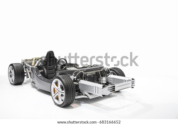 Formula one car engine detail isolated on\
white\
background.