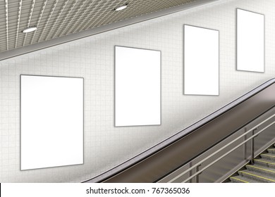 Four Blank Vertical Advertising Posters On Wall Of Underground Escalator. 3d Illustration