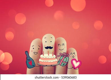 Four fingers decorated as four people having fun time. Suitable to be used for anything festivals. - Powered by Shutterstock