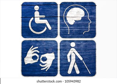 Four Grunge disabled symbols isolated on white