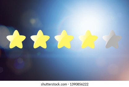 Four stars on blue bright background