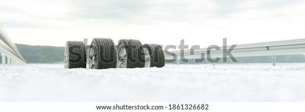 Four winter tires snowed in snow in winter on\
a road (3D\
Rendering)